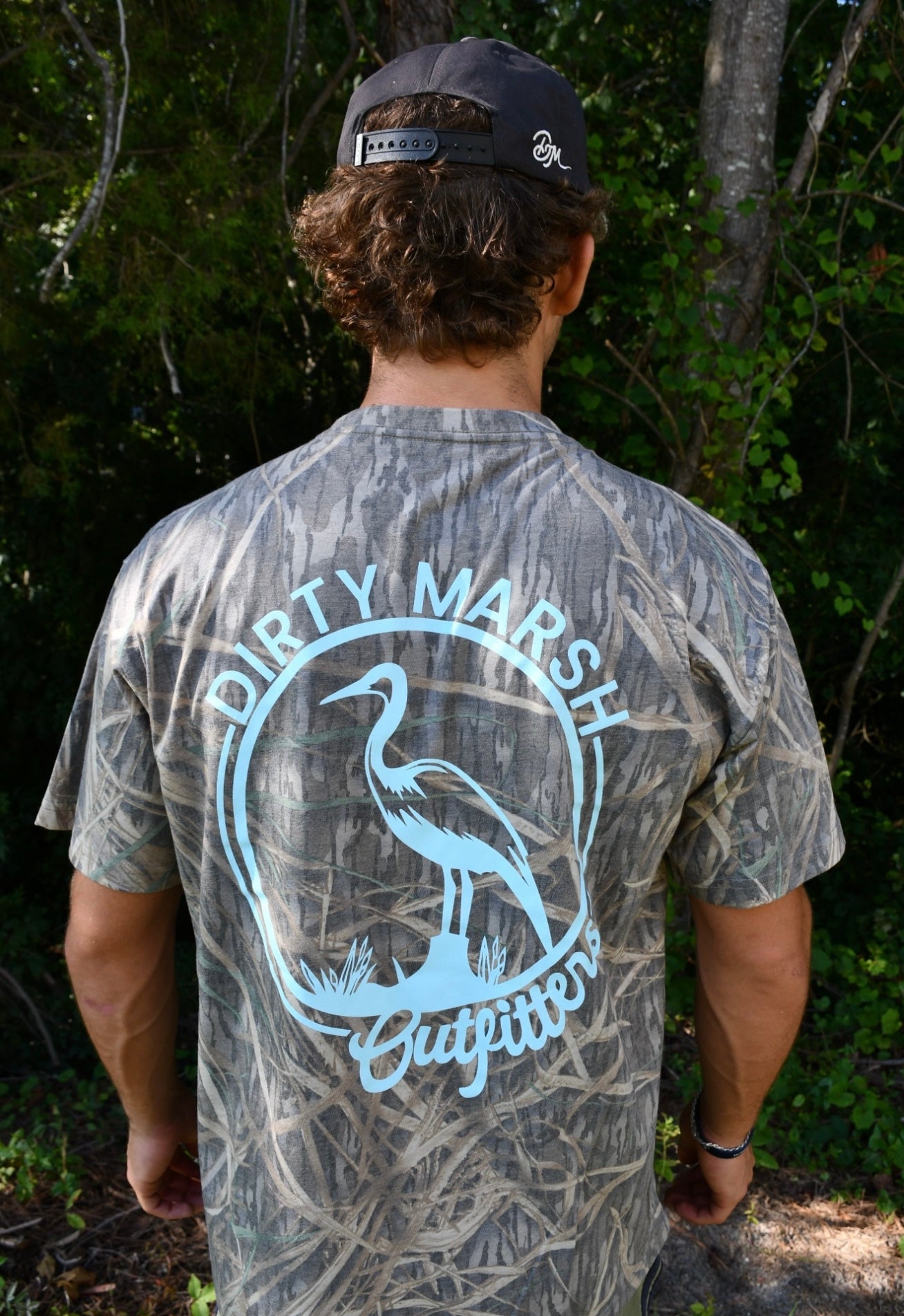 Dirty Marsh Teal Circle Logo - Mossy Oak Shadowgrass