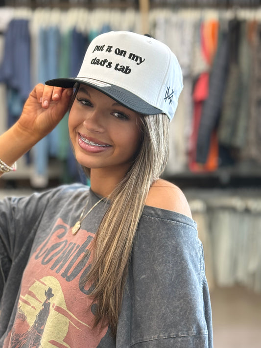 MHC Put It On My Dad's Tab Trucker Hat: Black/White Otto