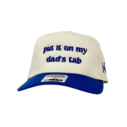 MHC Put It On My Dad's Tab Trucker Hat: Royal/Natural Otto