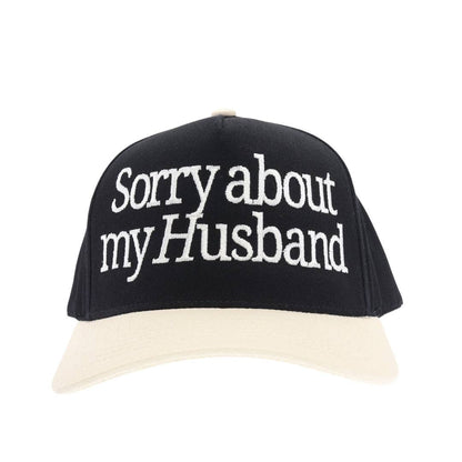 Sorry About my Husband Embroidered Trucker Hat: Black
