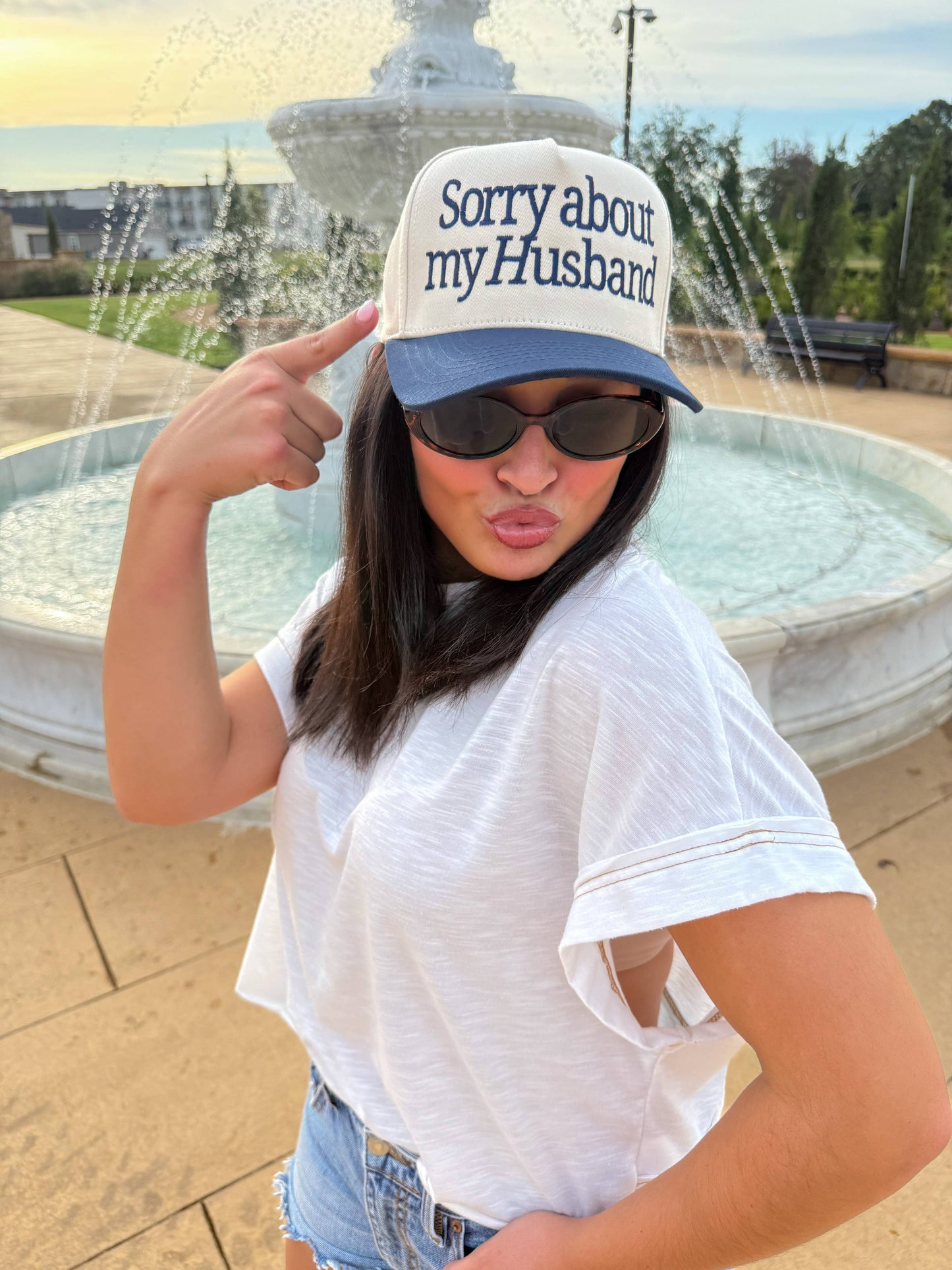 Sorry About my Husband Embroidered Trucker Hat: Black