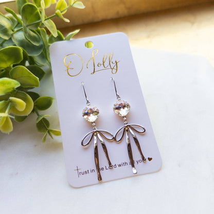 O’Lolly “Blakely” Earrings- Clear Stone w/Gold Bow Dangle: Yellow Gold