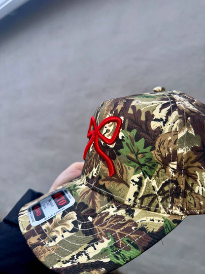 Camo Bow Embroidered Trucker Hat: Pink
