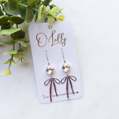 O’Lolly “Blakely” Earrings- Clear Stone w/Gold Bow Dangle: Yellow Gold