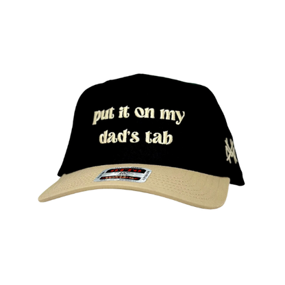 MHC Put It On My Dad's Tab Trucker Hat: Royal/Natural Otto