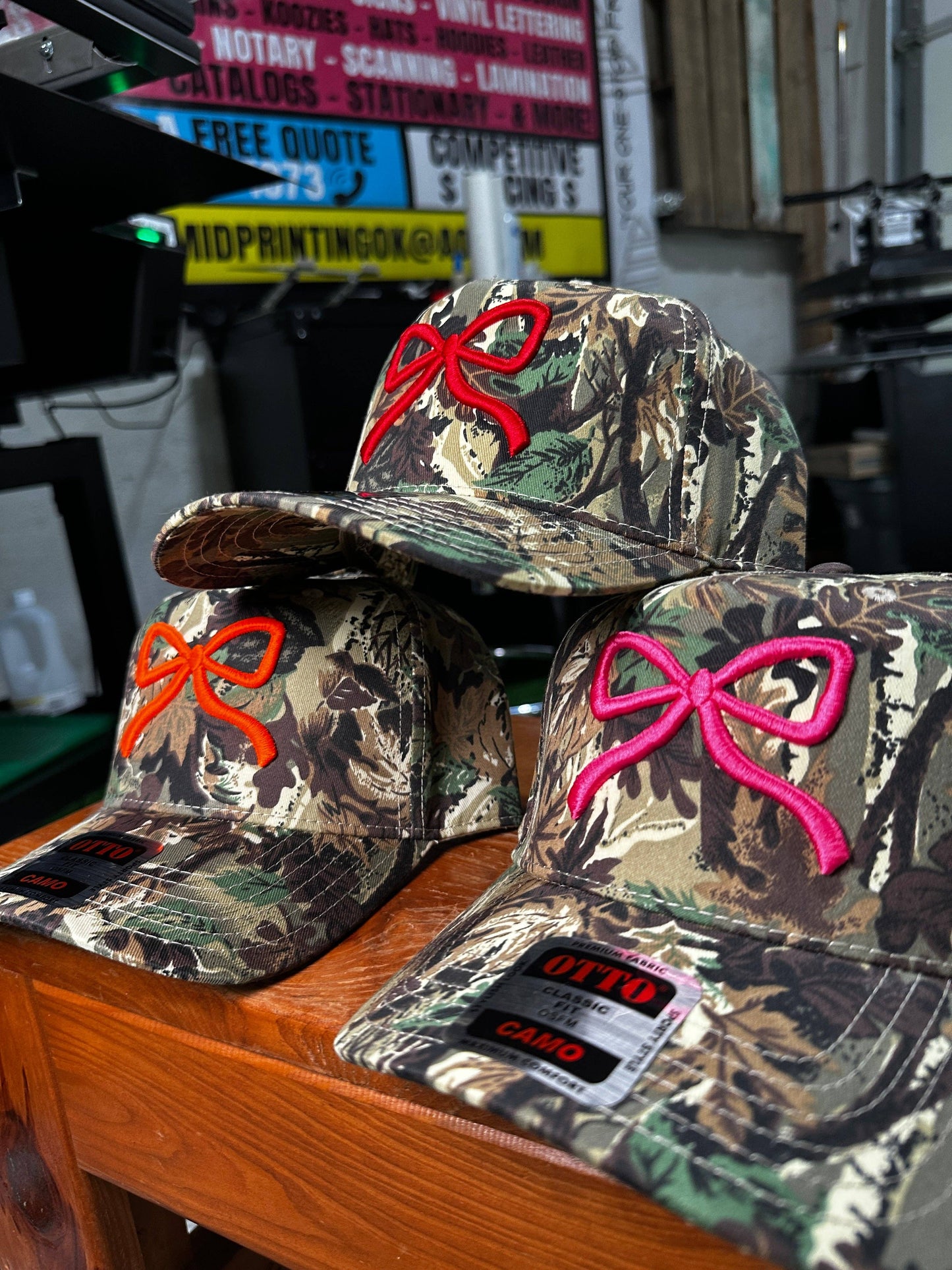 Camo Bow Embroidered Trucker Hat: Red