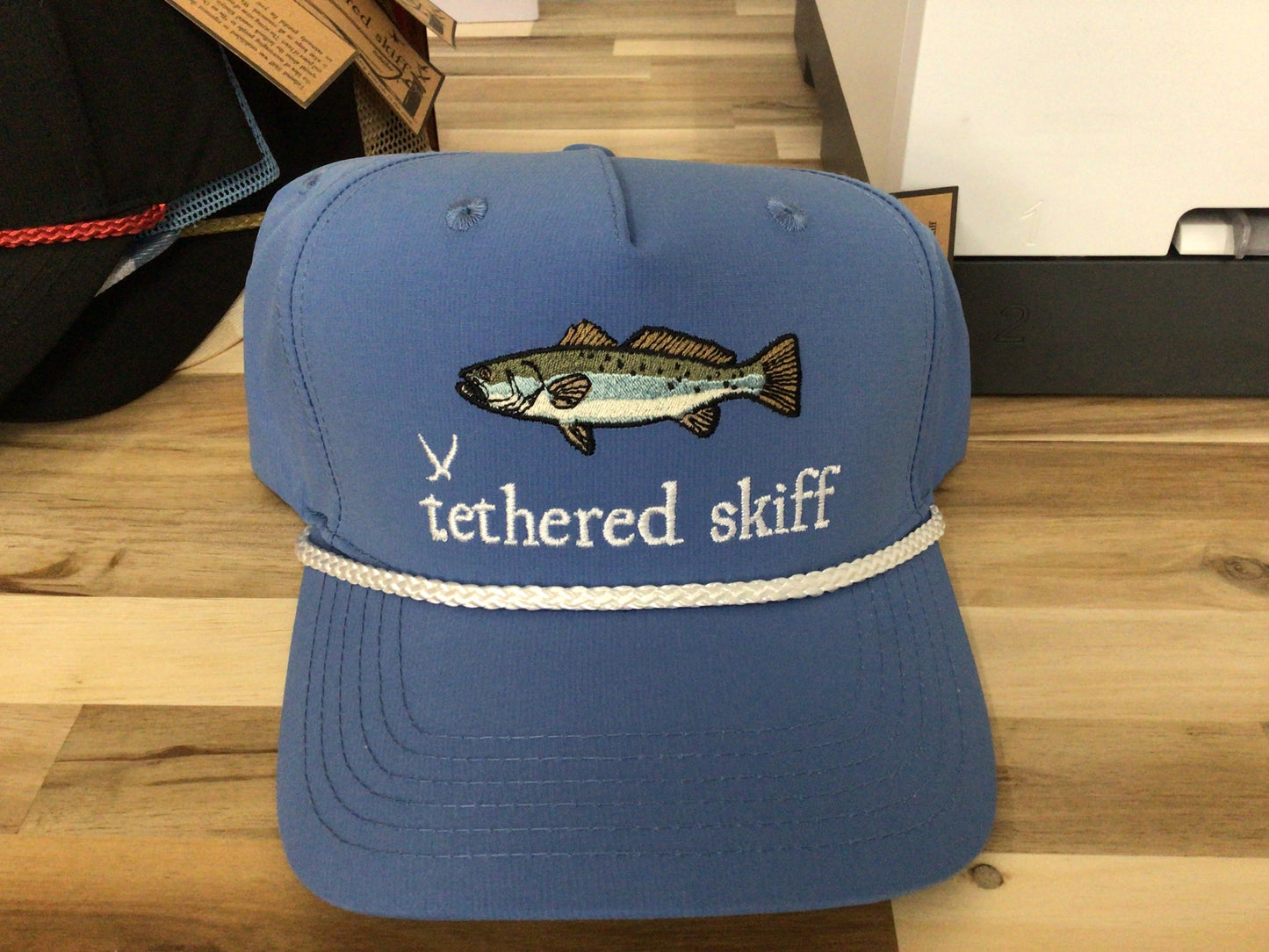 Tethered Skiff speckled trout- blue white rope