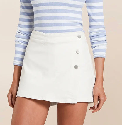 RISEN HIGH RISE BUTTON SKORT || White DENIM