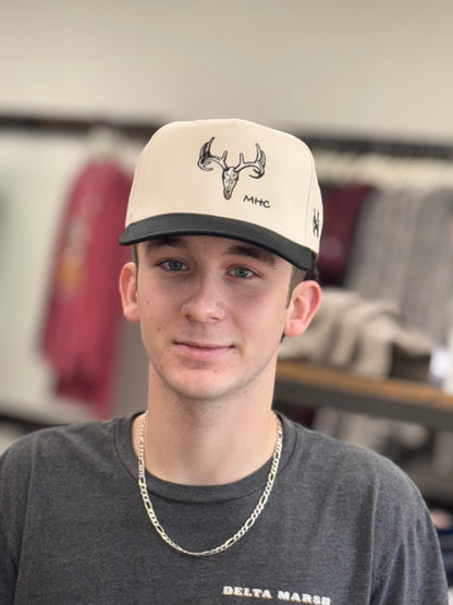 MHC Deer Skull Trucker Hat: Black/Natural Otto