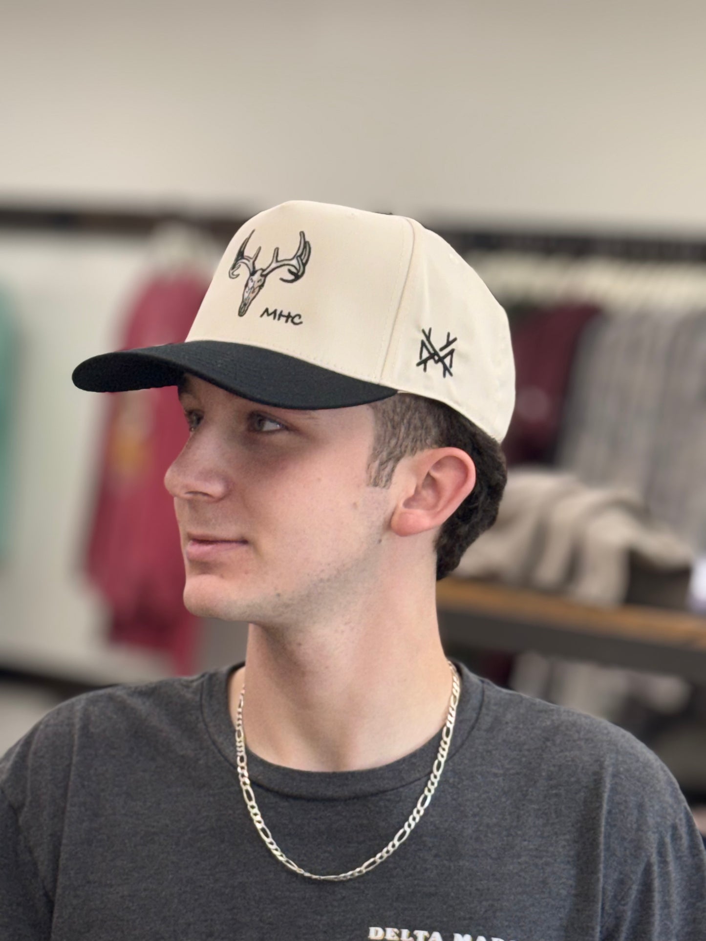 MHC Deer Skull Trucker Hat: Black/Natural Otto