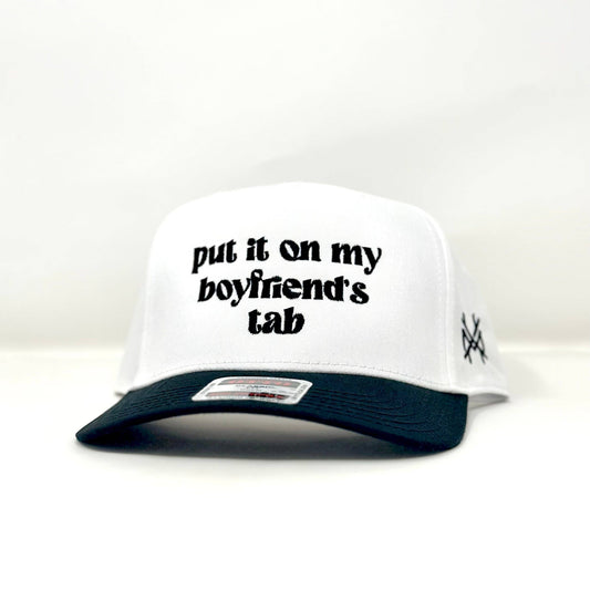 MHC Put it On My Boyfriends Tab Trucker Hat: Otto Black/ White