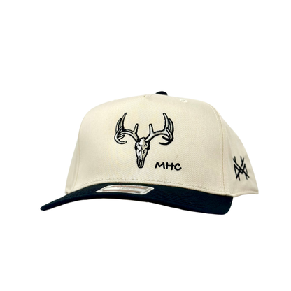 MHC Deer Skull Trucker Hat: Black/Natural Otto